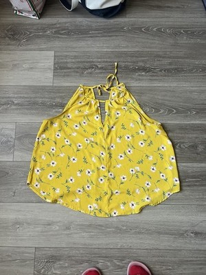 Francesca s Yellow floral loose halter top with tie back detail. Size: M