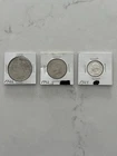 Lot of 3 coins - 1922 Peace Dollar, 1992 Kennedy Half, a 1964 Washington Quarter