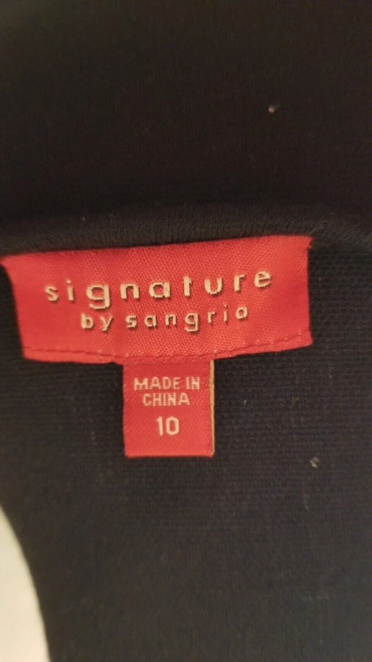 Vestido firma sangría, blanco y negro. Manga larga. Talla 10. Foto 3 de 4