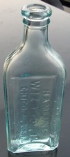 ANTIQUE VINTAGE EMBOSSED HAMLINS WIZARD OIL CHICAGO, U.S.A. GLASS BOTTLE SWEET
