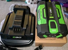 2 Genuine 2.5AH Ego Batteries And Charger. 1 New, 1 Slightly Used. Charger New!