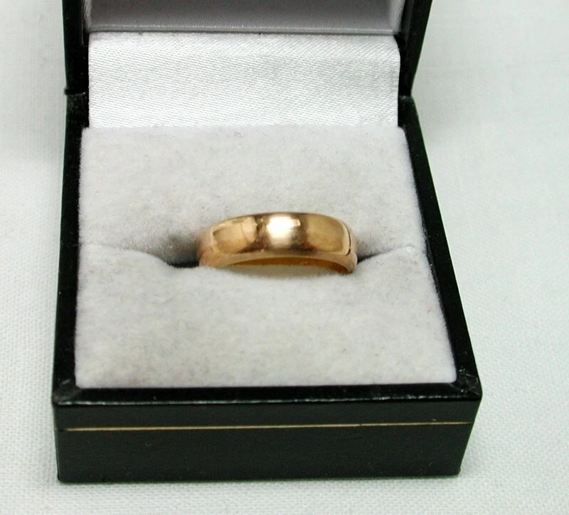 Small gold shop band ring