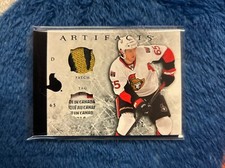 2012/13 UPPER DECK ARTIFACTS BLACK ERIK KARLSSON PATCH TAG 1/2  #27 SENS