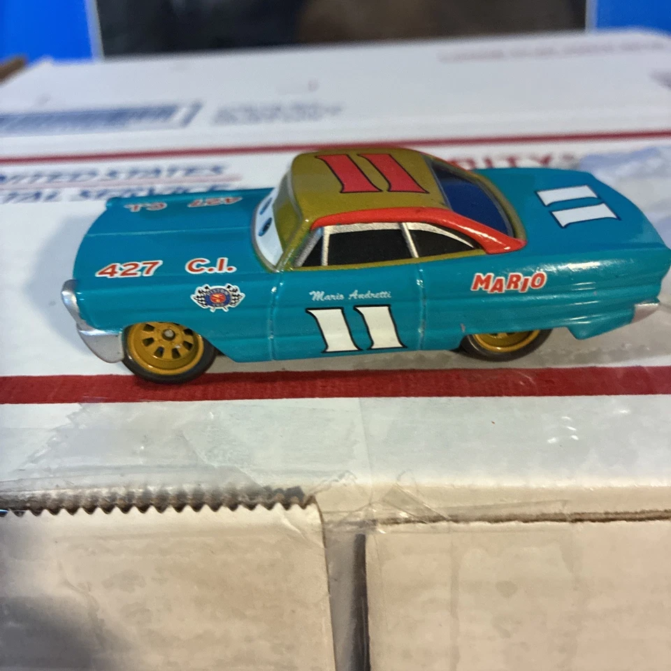 Disney Cars Mario Andretti Escala: Vehículo fundido a presión escala 1:55, Usado Foto 2 de 4