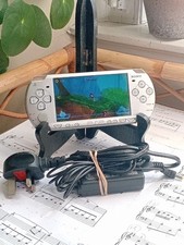 Sony PSP 2003 Slim Silver Console. Tested. c/w Charger & Sonic Rivals Game