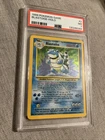 Near Mint Holographic Blastoise Pokémon Card 2/102 Graded PSA 7