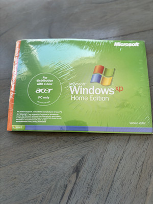 Microsoft Windows XP Home Edition 2002 Brand New Factory Sealed Dist w/new comp
