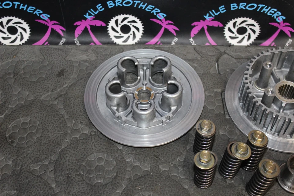 Honda 87-99 CR125R 1988 OEM embrague completo con placas cubo de cesta 22100-KZ4-700 Foto 2 de 4