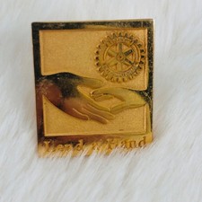 Rotary Club International Gold Tone Member Lapel Pin - Lend a Hand