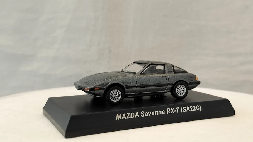 Coche modelo diecast gris KYOSHO 1/64 Mazda Savanna RX-7 SA22C Foto 3 de 4