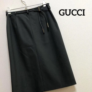 GUCCI Jupe serrée longueur genoux déco ceinture grise taille 38