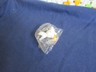 tiny white plastic bunny in package — photo 9
