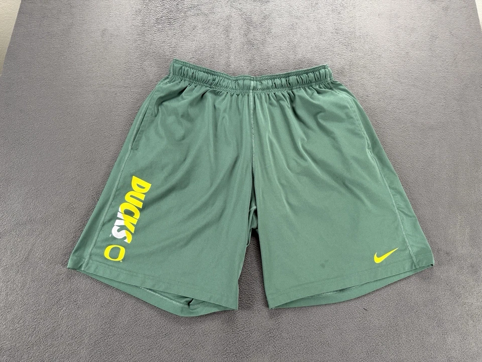 Pantalones Cortos Atléticos Oregon Ducks Nike Dri-FIT Verde Amarillo Logo Para Hombres Grandes Elastizados Foto 3 de 4