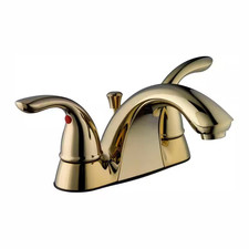 Builders 4 In. Centerset Double Handle Low-Arc Bathroom Faucet in Polished Brass