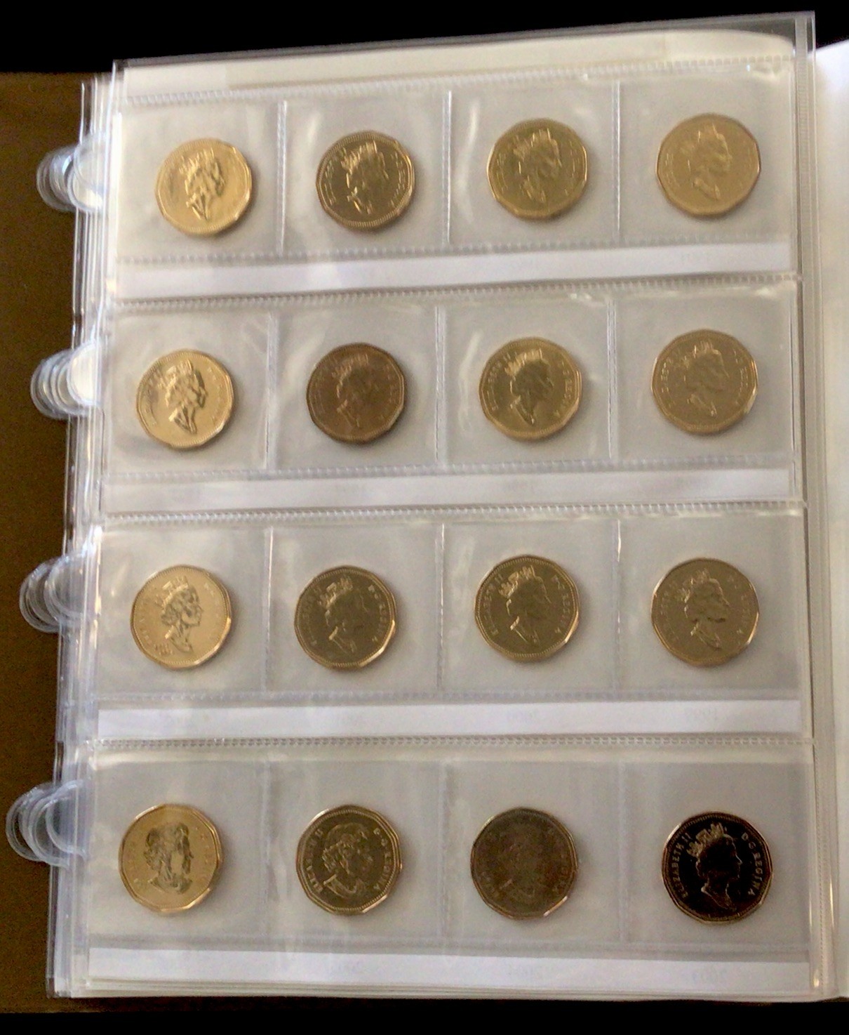 Canada Dollars 1935-1986 Uni-Safe Book! With 56 Coins 1965-2016! ENN Coins