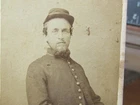 Civil War soldier holding a possible cannon ball cdv photograph