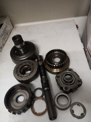 USED 200-4R FRONT/REAR PLANET SETS W/OUTPUTSHAFT AND SUNSHELL