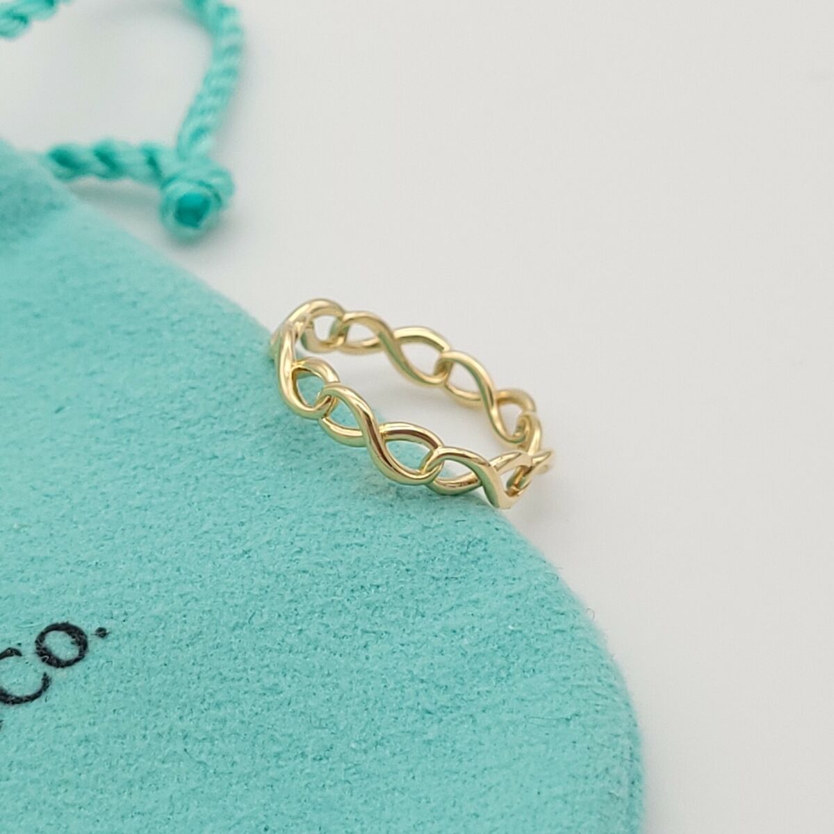 Tiffany & Co. AU750 18 Karat Yellow Gold Infinity Narrow Tiffany & Co. AU750 18 Karat Yellow Gold Infinity Narrow