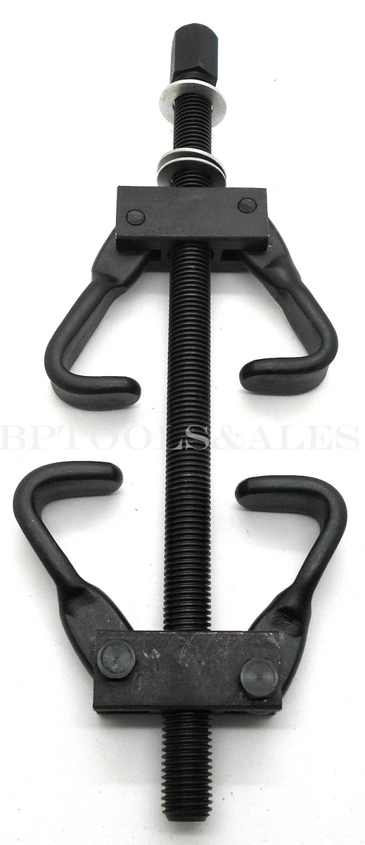 Internal spring compressor tool outlet