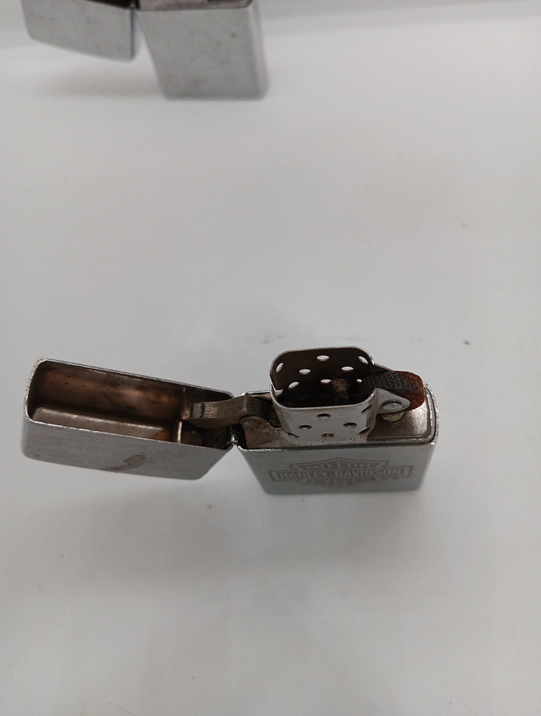 Vintage Zippo Lighter lot Of 4. CAT Caterpillar, Harley Davidson, Basic