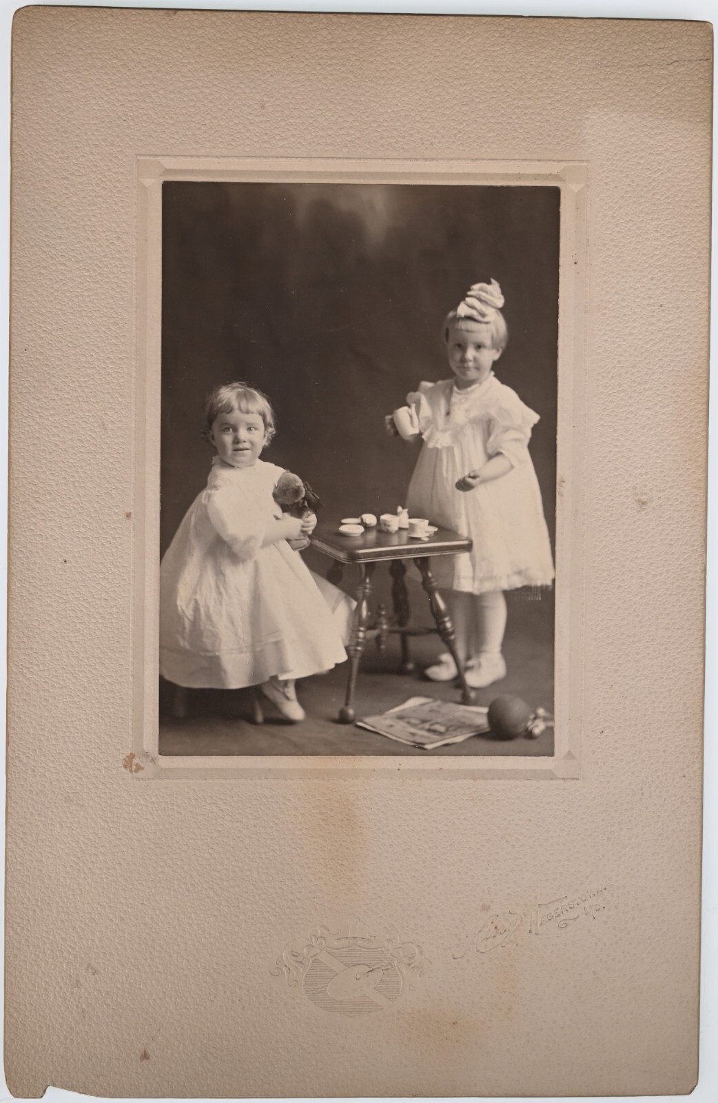 C. 1900s MOUNTED BOARD PHOTO TWO CUTE LITTLE GIRL HAVING A TEA PARTY HAGERS MO.