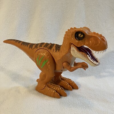 Robo Alive Attacking T-Rex Dinosaur Battery-Powered Robotic Toy by Dolgen 7''x12''