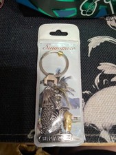Singapore Souvenir Keychain  Silver And Gold In Color