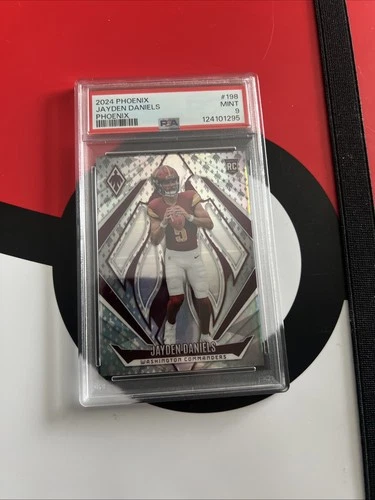 2024 Panini Phoenix Jayden Daniels RC Team Hlemt /399 PSA 9