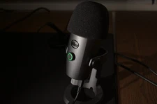 Blue Yeti Nano Premium USB Microphone - Black, with a desk stand and pop filter.