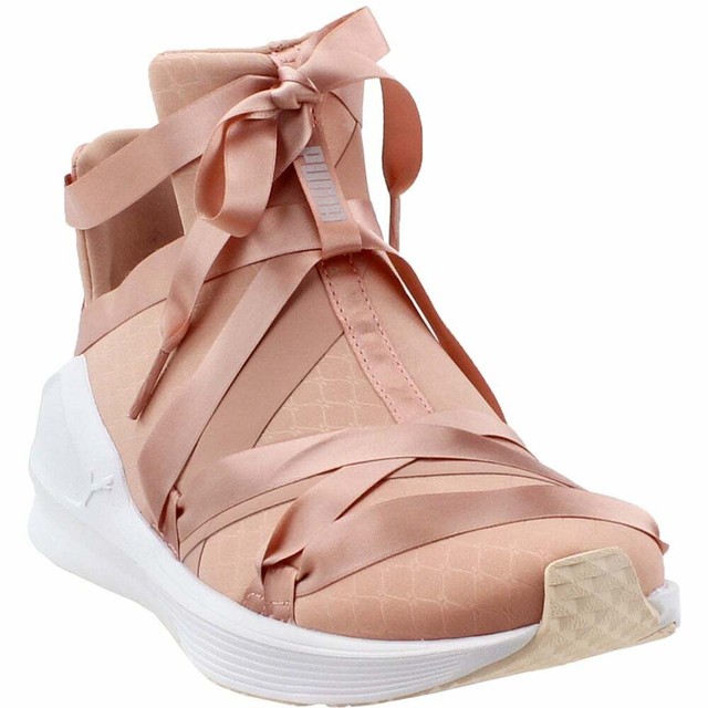 white and gold running shoes