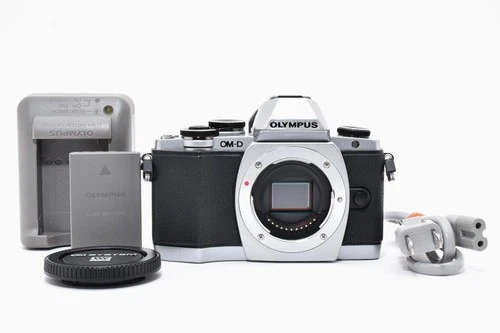 *MINT* DDP US Olympus OM-D E-M10 16.1MP Digital SLR Camera Silver [1413 Count]
