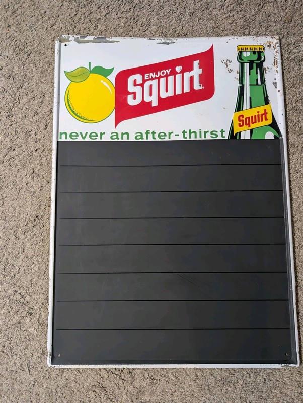 1971 Press Sign vintage embossed menu sign.  "Enjoy Squirt" Soda Pop