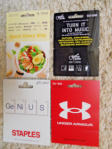 Collectible Gift Cards, four new, unused cards, no value on the cards    (Y-3)