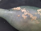 Antique Green Glass Torpedo Bottle With Stuff Inside — photo 9
