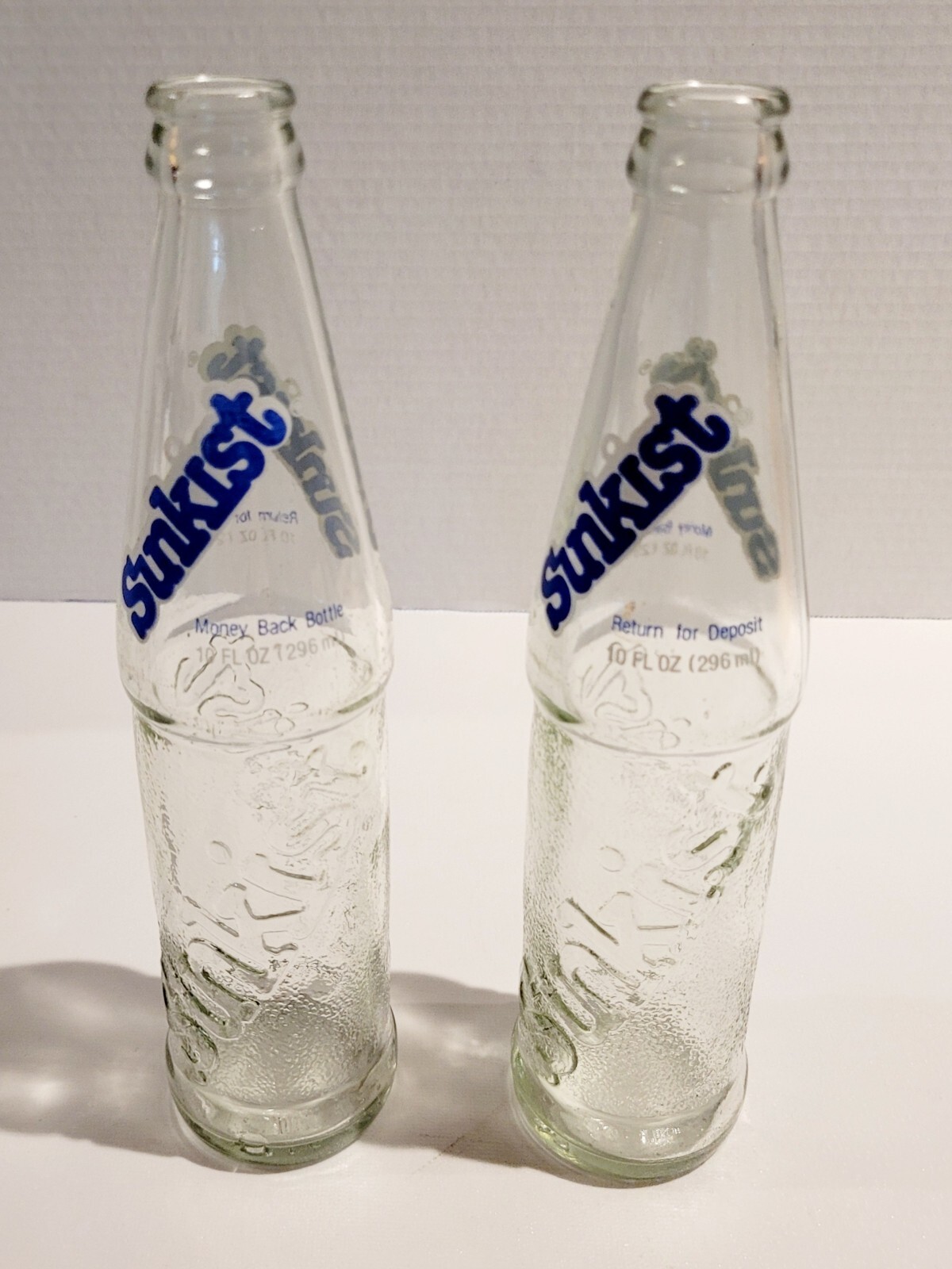 VINTAGE 2 SUNKIST SODA BOTTLES W/RETURN FOR DEPOSIT-1980'S-10 OZ SIZE