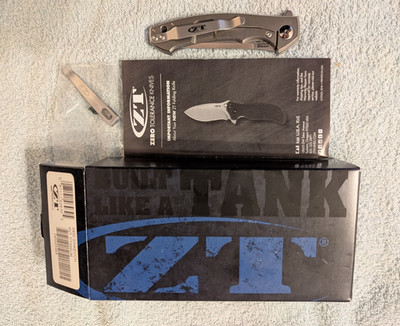 Zero Tolerance ZT 0450 Sinkevich Plain Edge Titanium Frame Lock Manual