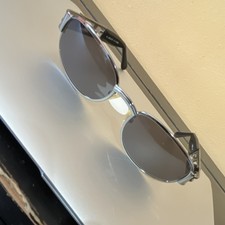 Fendi Women's Oval Sunglasses Silver Frame Logo Temples Gray Tinted Lenses