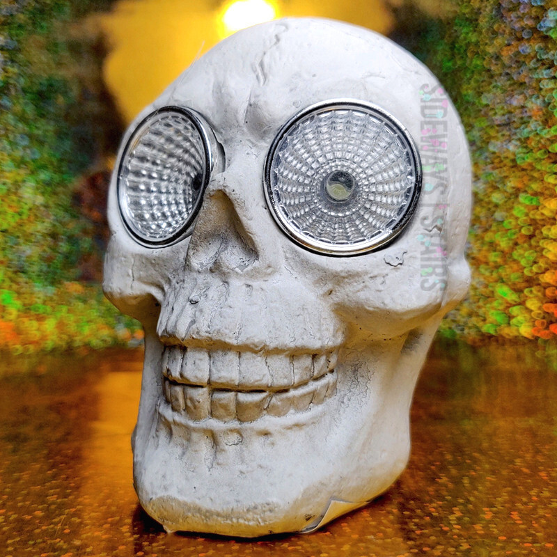 PLASTER SKULL W/ SOLAR LIGHT EYES Halloween garden ornament