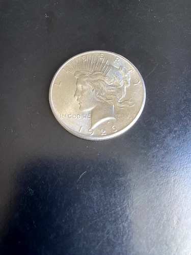 1926 SILVER PEACE DOLLAR, PHILADELPHIA MINT. VERY NICE UNCIRCULATED COIN.