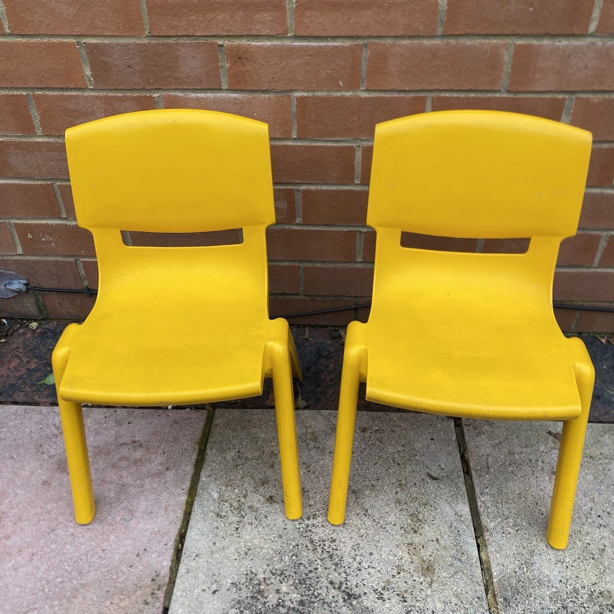 Pair of Yellow Sebel Postura Sturdy Strong Plastic Stackable