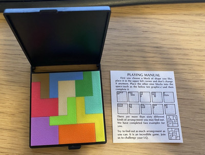 IQ Block Travel Puzzle Game 10 Color Pieces Pocket Case Manual Brain Teaser Toy