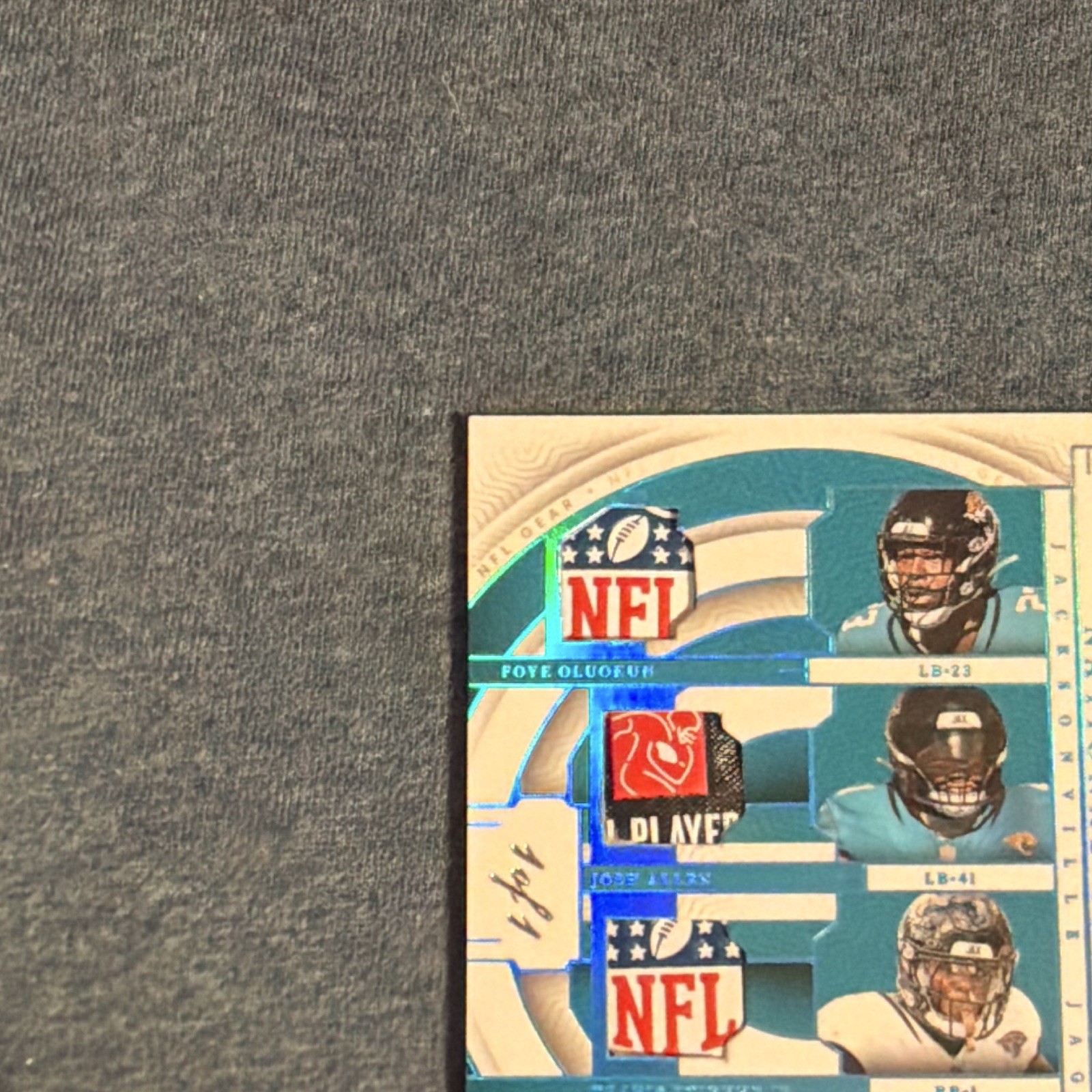 2023 Panini National Treasures Quad NFL Shield Lawrence/Etienne/Allen/Olad 1/1 view 2