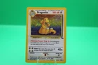 Dragonite Pokémon Fossil Holo Unlimited 4/62 WOTC Creased Damaged- HP