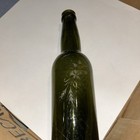 Vintage Green glass bottle with etching — photo 1