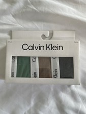 Calvin Klein Women's Carousel Logo Cotton Thong Panty 3 -Pack, Multicolor, Large