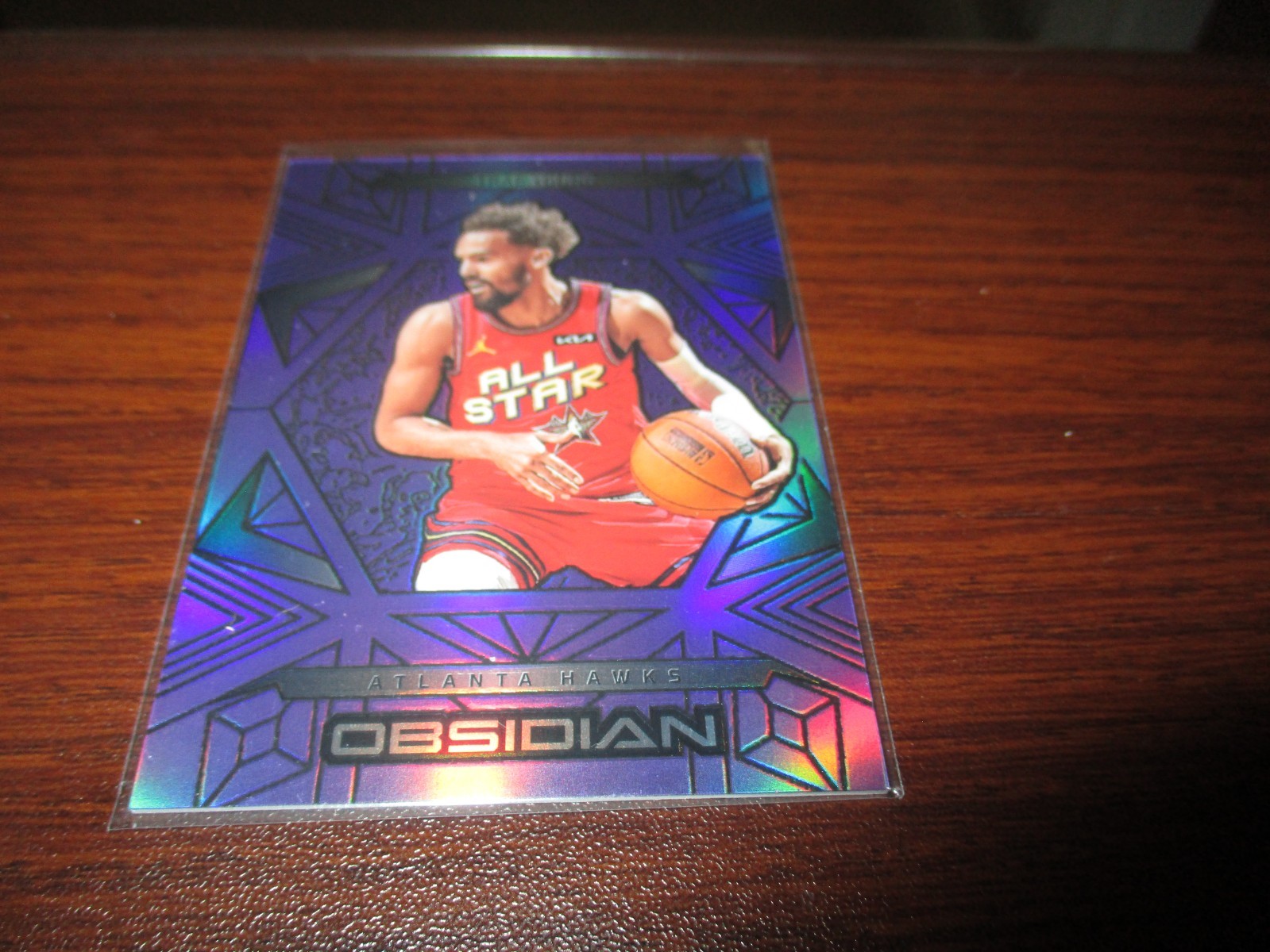 Trae Young 2024-25 Panini Obsidian Electric Etch Purple #197 /75