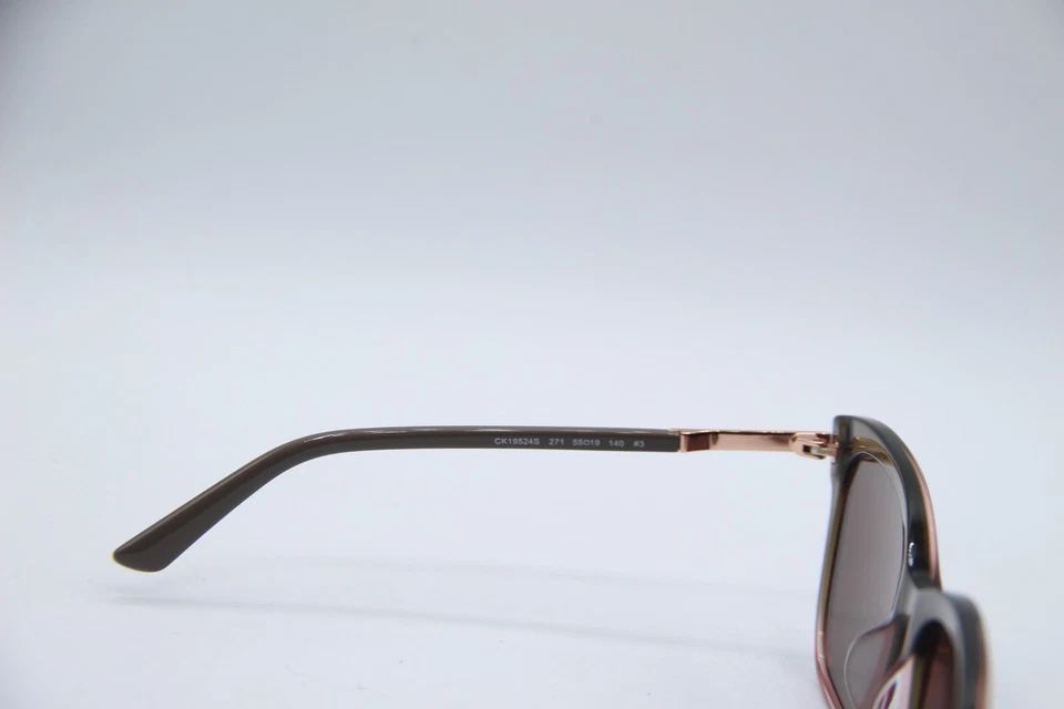 GAFAS DE SOL AUTÉNTICAS CALVIN KLEIN CK19524S 271 GRIS CLARO MORERA DORADO 55-19 Foto 3 de 4