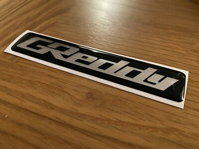 Greddy gewölbtes Harz Logo Einlass Plenum Aufkleber.
