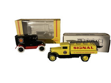 Pair Of New In Boxes Ertl Collector Die Cast Truck Banks Signal Truck and Shell