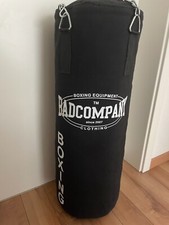 neuwertiger Boxsack von Bad Company, 80 x 30 cm, schwarz mit Kettenaufhängung